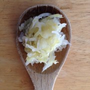 sauerkraut on wooden spoon